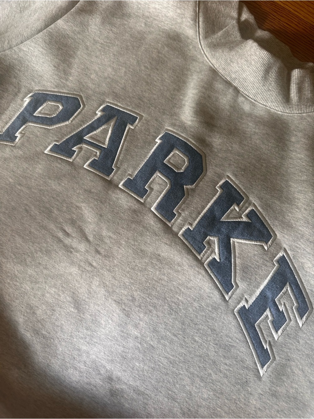 Parke  Light Gray Mock neck  Sweatshirt with Denim Blue Appliqué